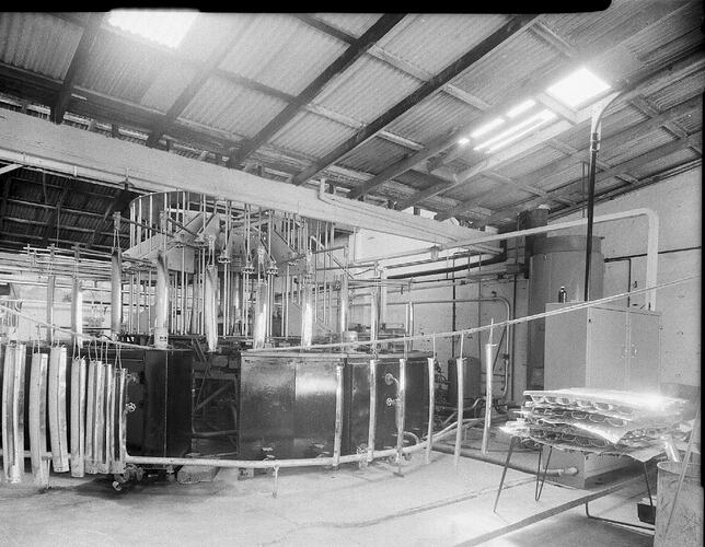 Monochrome photograph of a machinery.