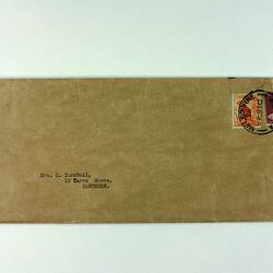 Rectangular brown envelope with typed address and stamp