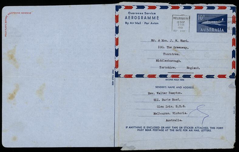 Aerogramme, unfolded with black typewritten text.