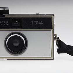 Black and grey plastic camera with black strap.