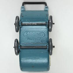 Underside of toy pram, with four wheels.