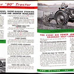 Open booklet, two tractor images with red, black and green printing.