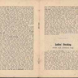 Open booklet with off-white pages and black printed text.