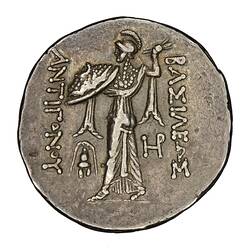 Goddess Athena standing facing left about to hurl a thunderbolt. She protects herself with a shield.