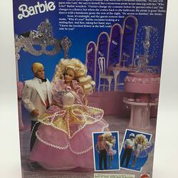 Back of barbie doll box. Images of Barbie and Ken with blue background.