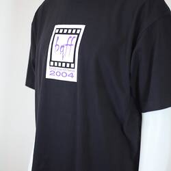 Black t-shirt with printed logo on mannequin.