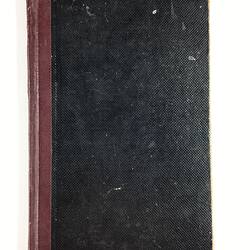 Black cover, red spine.