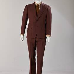 Brown jacket and pants suit.