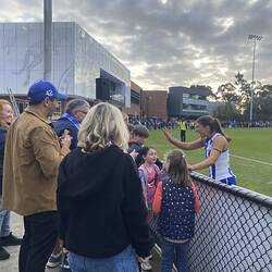 Digital Image - Ruby Tripodi Greeting Her Family, Arden Street Football Ground, North Melbourne, 10 Sep 2023