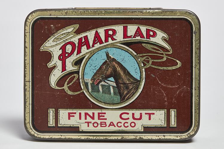 Rectangular maroon tobacco tin with brown racehorse head facing left. Text above and below.