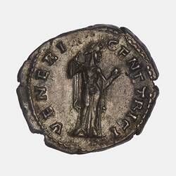 Roughly round coin with standing female figure facing right holding robe with her right hand and holding an apple in her left. Text around.