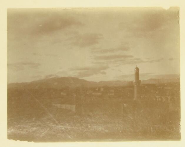 town with minaret in foreground.
