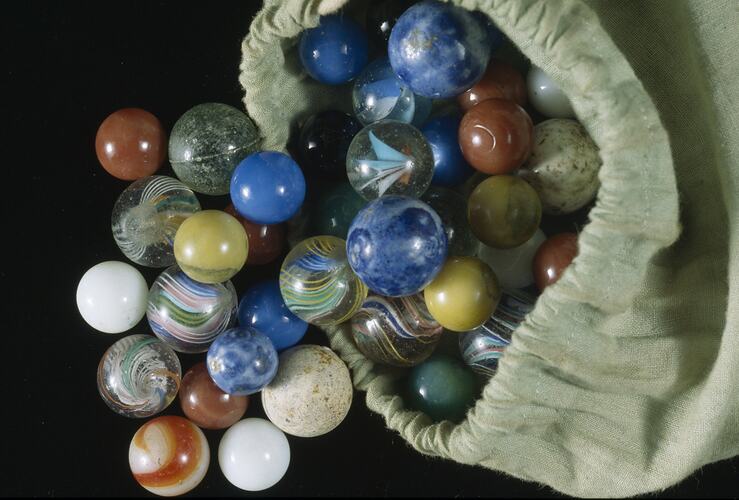 Bag with coloured marbles.