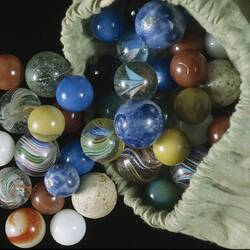 Marbles in Bag - Green Cloth