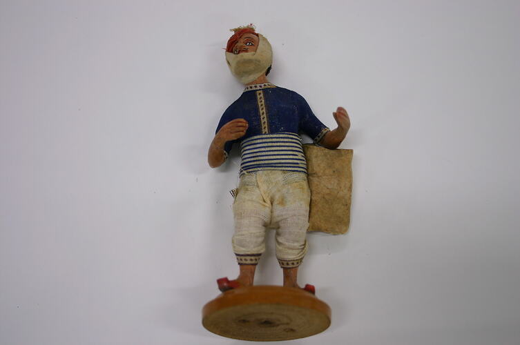 Indian Figure - Man with Bandaged Face, Clay