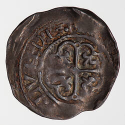 Coin, off-round, at the centre within a line circle a cross moline with a fleur-de-lis in each angle; around.