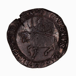 Coin, round, at centre within a circle of beads; crowned king wearing long scarf and holding sword upright.
