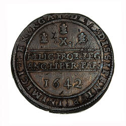 Coin, round, within a beaded circle, three plumes above the Roman numeral XX, text below.