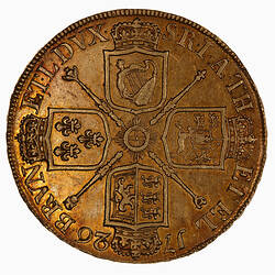 Round gold coin with cresent.