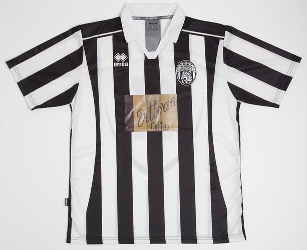 Black and white striped jersey, "Vittoria Coffee" logo.