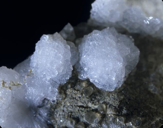 Angular balls of white minerals.