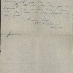 Single page on with blue handwritten text, with fold lines on page and section in top-left corner cut out.