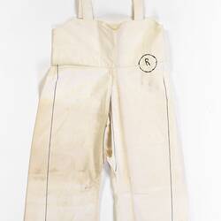 Cream calico overall-style bodice attached at the waist to crutchless divided legs.