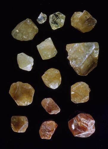 Cream, orange and brown uncut crystal specimens.