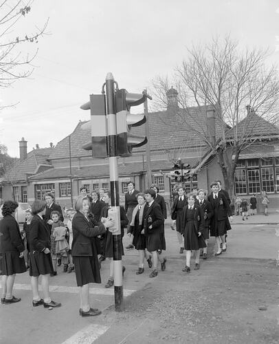 Teacher & Students Crossing the Road, Melbourne, Victoria, 1955-1956