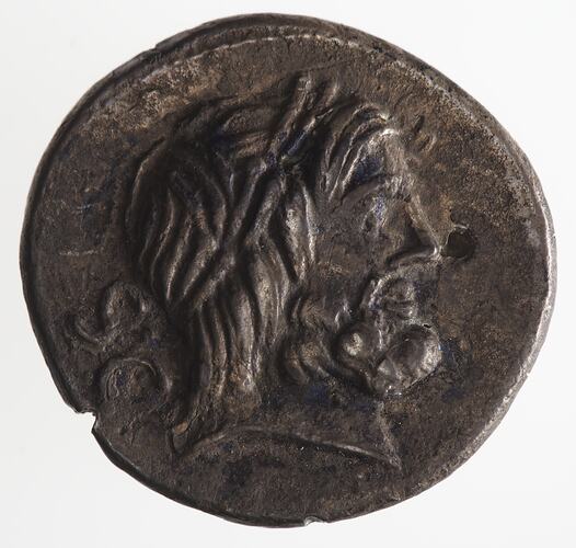 Round coin, aged, bearded male profile, facing right, wearing headdress.