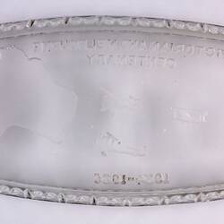 Underside of etched glass tray showing flight route.