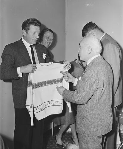 Australian Wool Board, Man Holding Knitted Jersey, Melbourne, Victoria, 11 Aug 1959