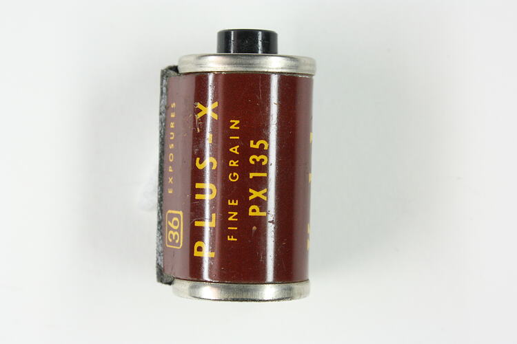 Cylindrical cartridge with maroon, pressed metal label.