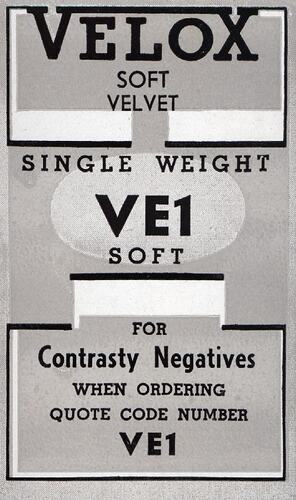 Grey paper label with printed black text.