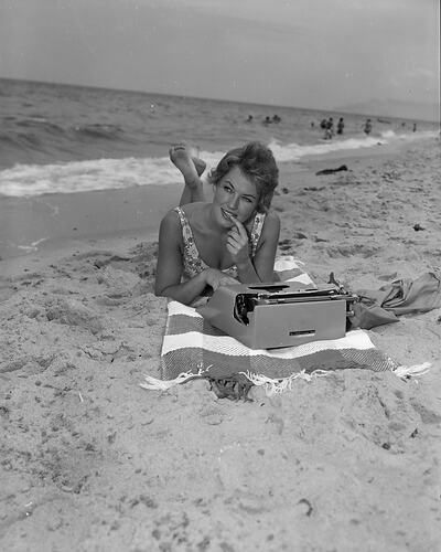 Woman on a Beach with a Typewriter, Sandringham, Victoria, 11 Jan 1960