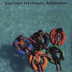 Magazine cover featuring children in swimming pool.