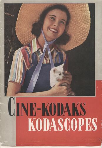 Cover page with photograph of woman and cat.