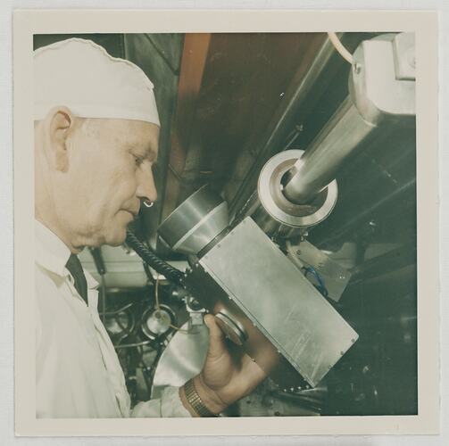 Worker Looking Through Infrared Viewer, Kodak Factory, Coburg, circa 1960s