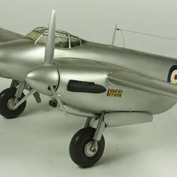 Silver model aeroplane.