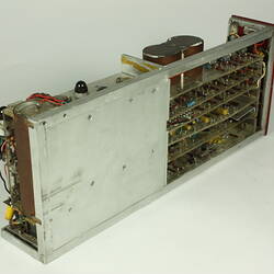 Side view of open metal box. Case partially removed to show internal wires and components.