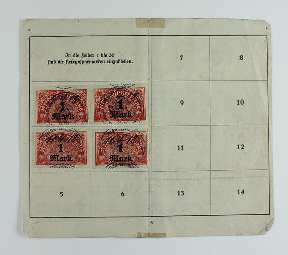 Front of ration card showing printed text and stamps.