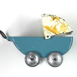 Blue and white toy pram.