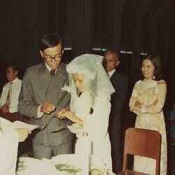 Digital Photograph - Minh Lam Placing Wedding Ring on Cuc Lam's Finger, Our Lady Church, Saigon, Vietnam, 30 May 1975