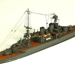Naval ship with two masts, three quarter view.
