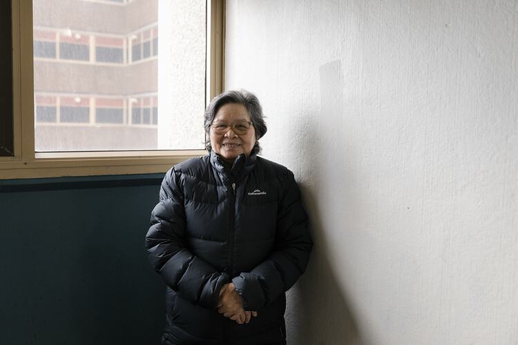 Public Housing Resident Hanh Bui Stands by a Window During the COVID-19 Pandemic, Richmond, Victoria, 7 May 2020
