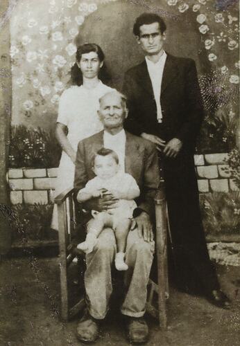 Efstathia Spiropoulos With Family & Son, Flessiada, Greece, 1947