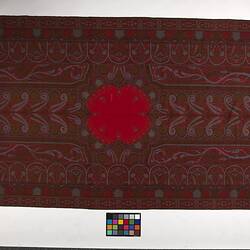 Finely woven red twill tapestry shawl with paisley design in red, orange, black, white and blue.