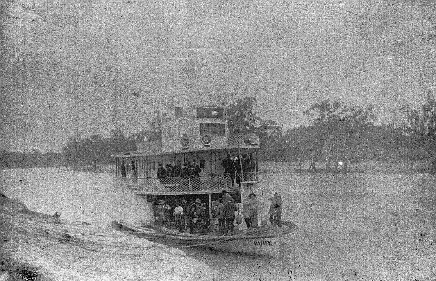 Negative people on the ruby paddle boat tied to the riverbank