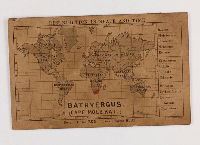 Retangular brown card with black and red text and map