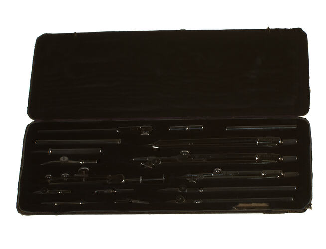 Set of drafting tools in a case